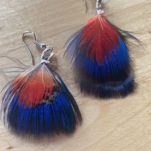 Feather earrings handmade by indigenous women Amazon Rainforest, Ecuador